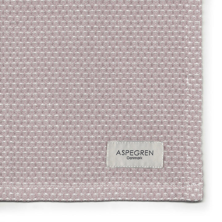 Close-up van biologische katoenen theedoeken in Gastro Wood Rose uit de Rose Quartz collectie
