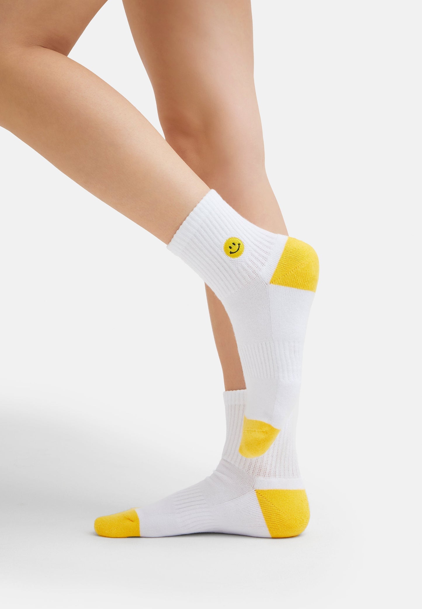 Smiley Socks - Biologische sneakersokken met geborduurde smiley