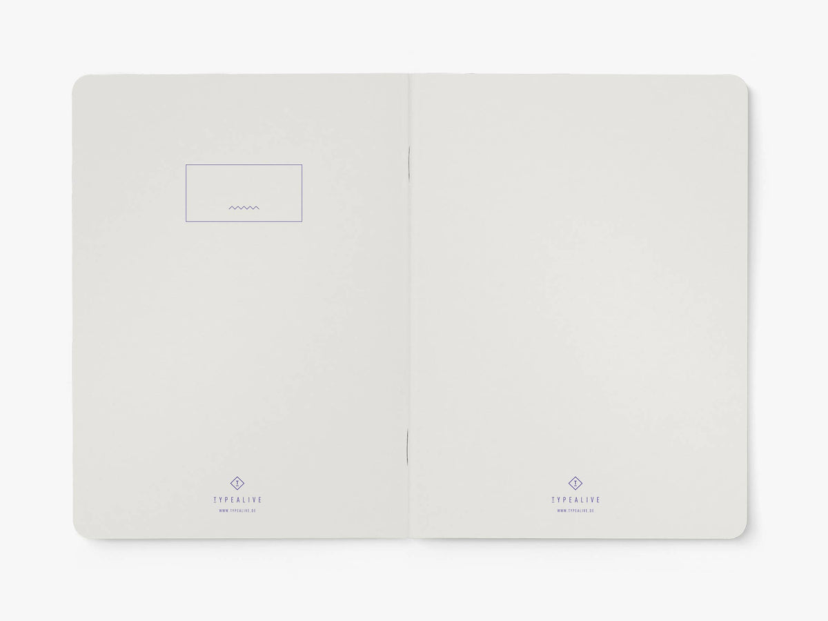 Opengeslagen notitieboek van typealive met blanco pagina's