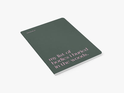 Notitieboek 'My list of bodies I buried in the woods' van typealive, schuin bovenaanzicht