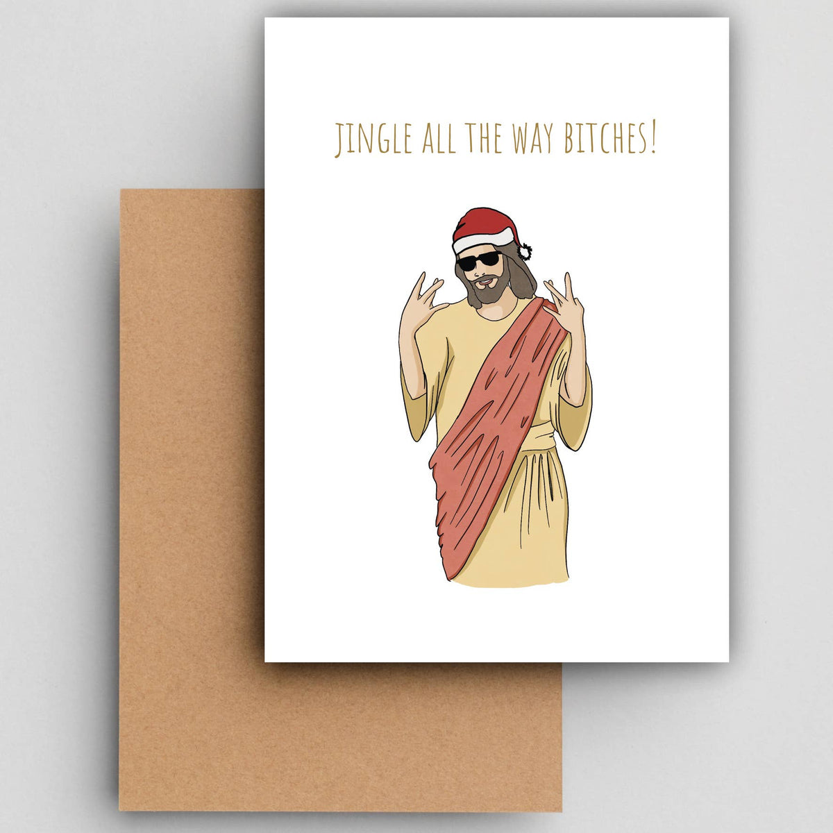 Wenskaart Jingle Jesus van Studio Raquelle: Jezus met kerstmuts en zonnebril, met de tekst Jingle all the way bitches!