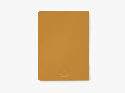 Achterkant van het okergele notitieboek 'People I want to punch in the face' van typealive