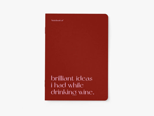 Notitieboek A5 van typealive, donkerrood met witte tekst 'brilliant ideas i had while drinking wine.', vooraanzicht