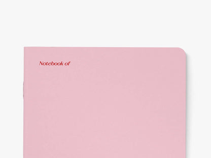 Close-up van de hoek van het roze notitieboek 'My poetry collection & penis doodles' van typealive
