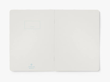Opengeslagen notitieboek van typealive met blanco pagina's