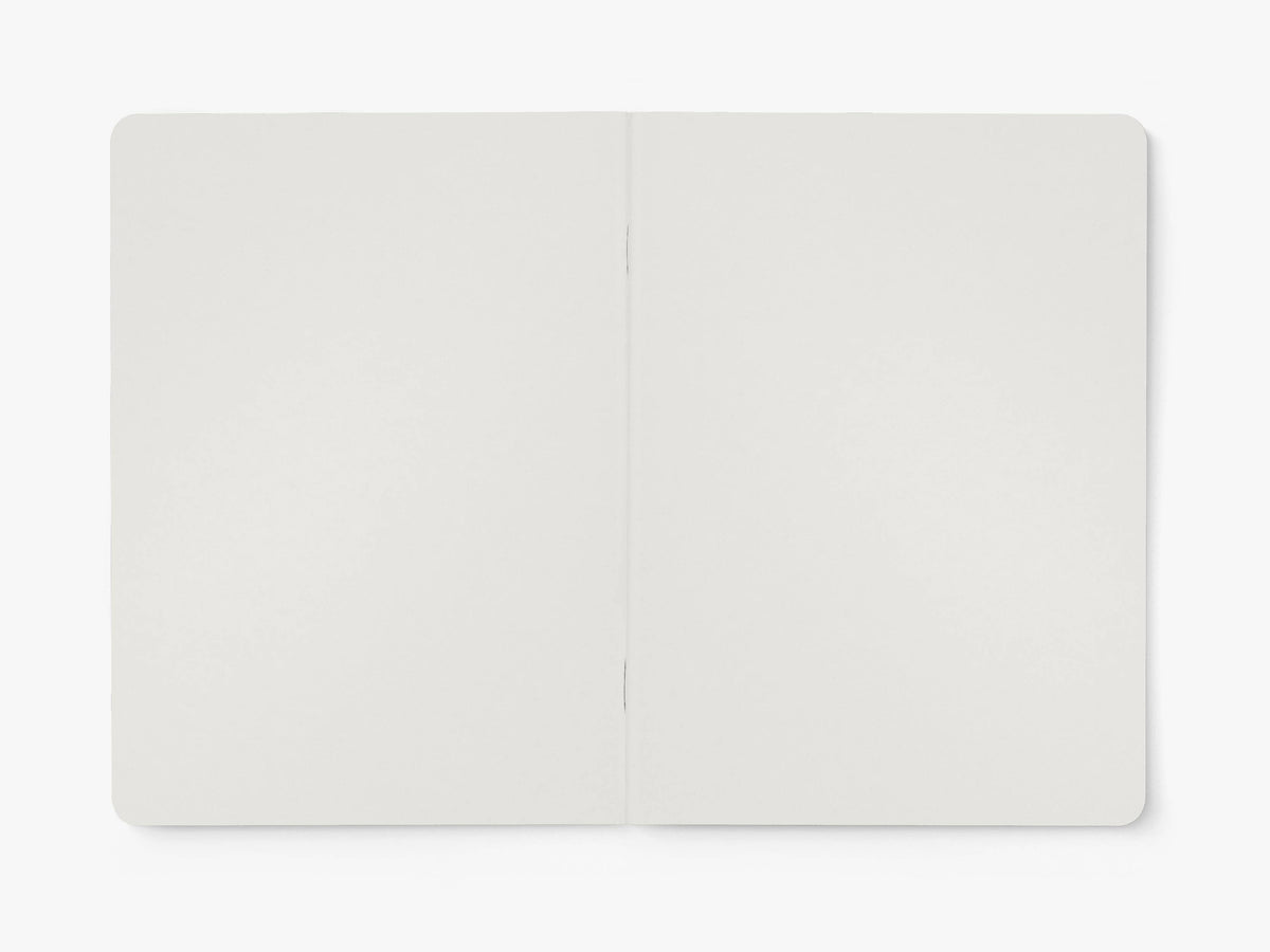 Opengeslagen notitieboek van typealive met blanco pagina's