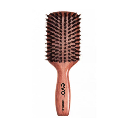 Evo conrad bristle paddle (dressing) brush  is de ultieme borstel om droog haar dagelijks mee te borstelen, updo's strak te stylen of krullen zacht uit te borstelen.