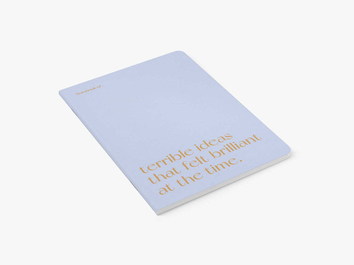 Notitieboek 'Terrible ideas that felt brilliant at the time' van typealive, schuin bovenaanzicht