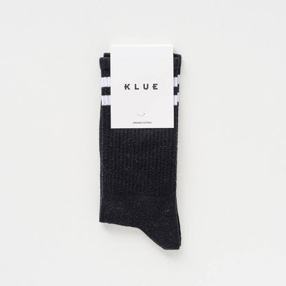 Klue retro sportsokken zwart-wit kleden je voeten in kleur en duurzaamheid.