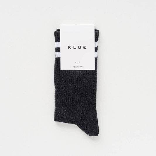 Klue retro sportsokken zwart-wit kleden je voeten in kleur en duurzaamheid.